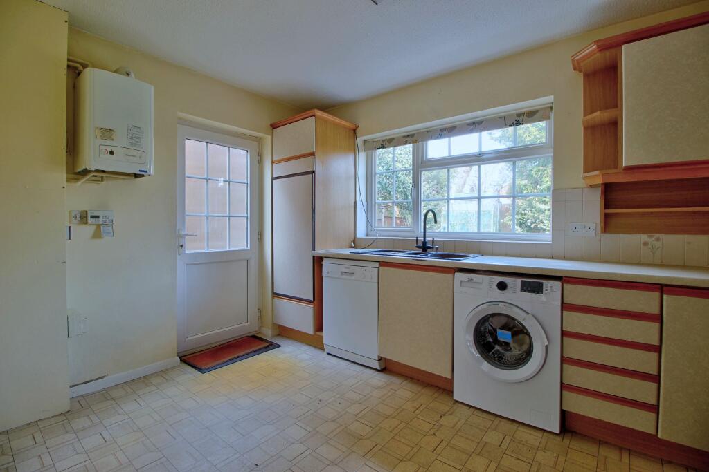 Kitchen overlooks attractive garden