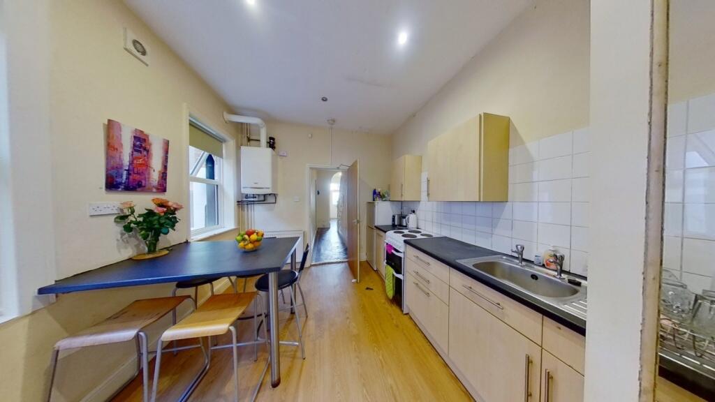 Bright and modern kitchen featuring plenty of c...