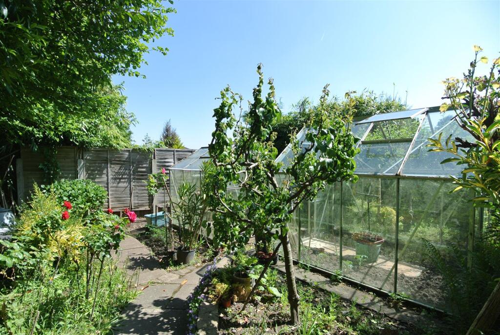 Green Houses Blue Sky best.JPG