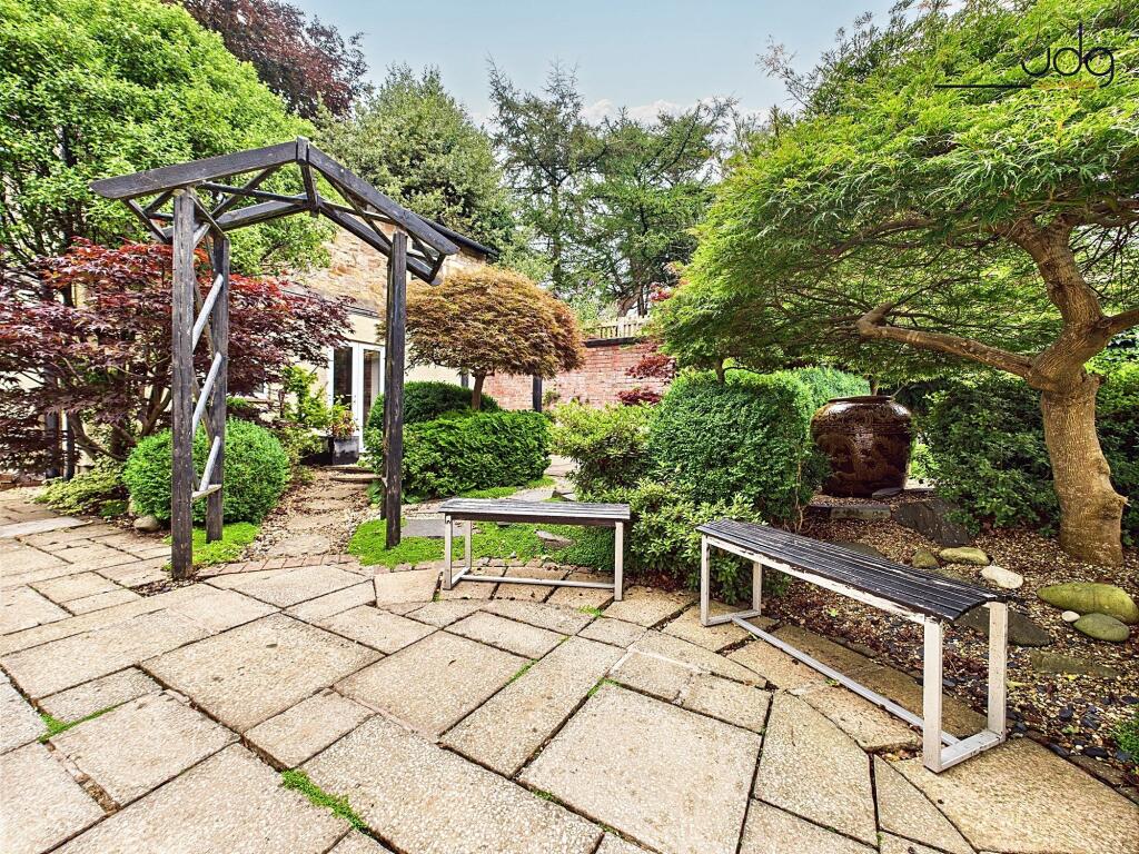 Landscaped Japanese style garden and seating area