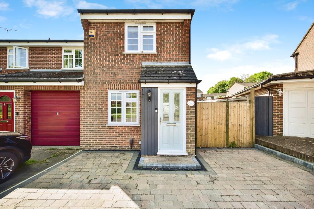 Outside View Of The Property With Driveway Parking