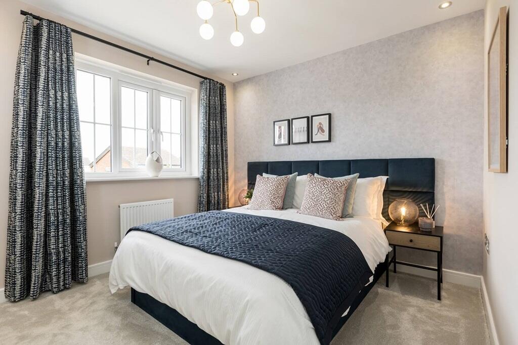 The main bedroom features an en suite for added luxury