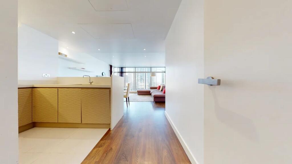 A spacious and modern living area with elegant ...