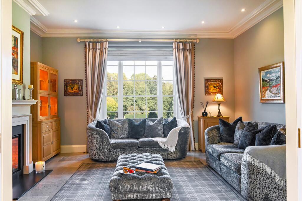 The light and bright snug accessed off the kitchen