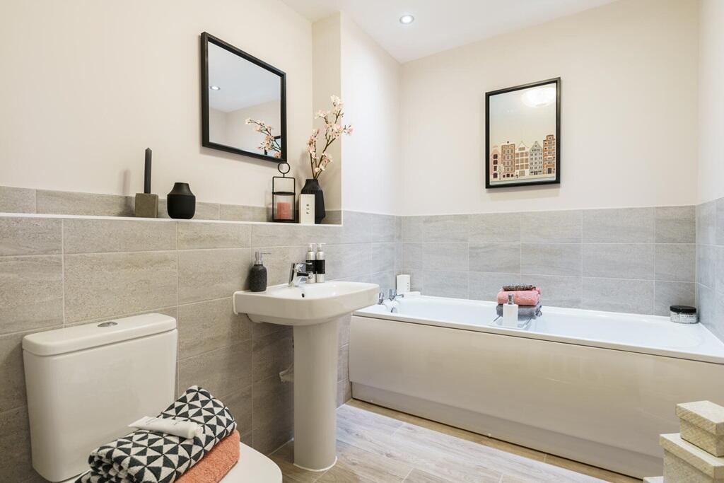 The main bathroom with high quality fixtures and fittings