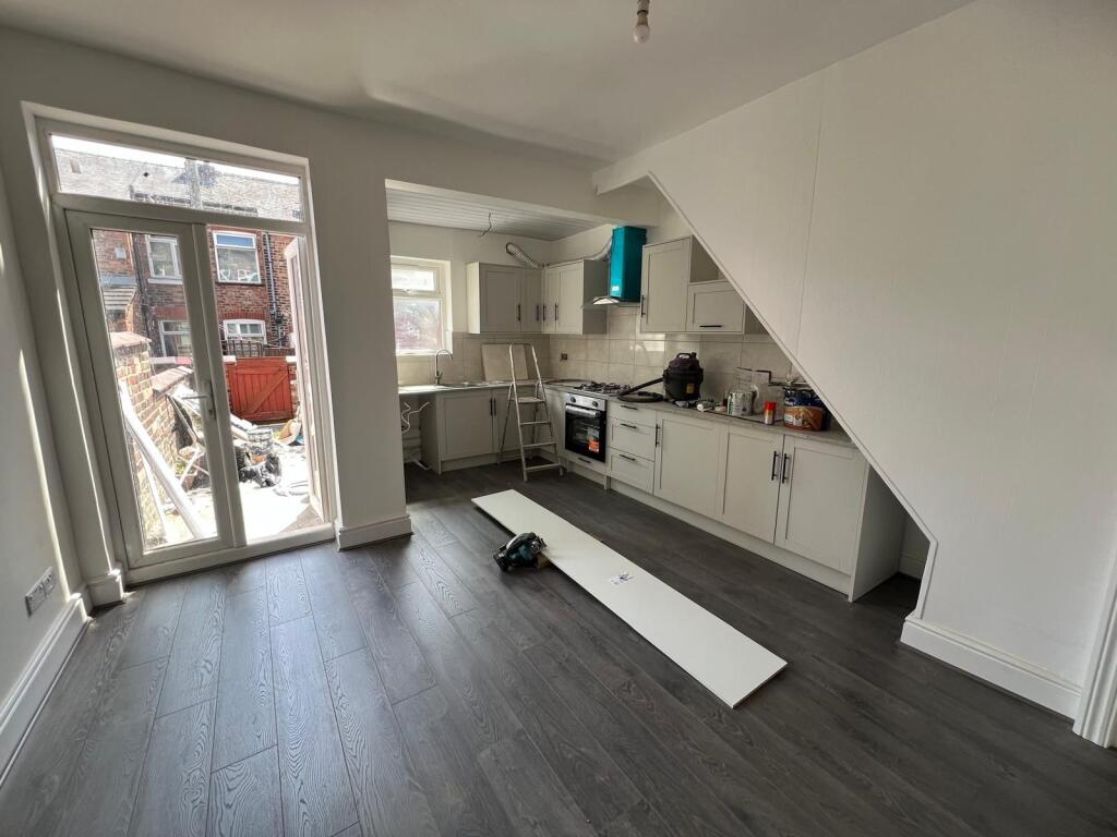 Bright modern kitchen with plenty of natural li...