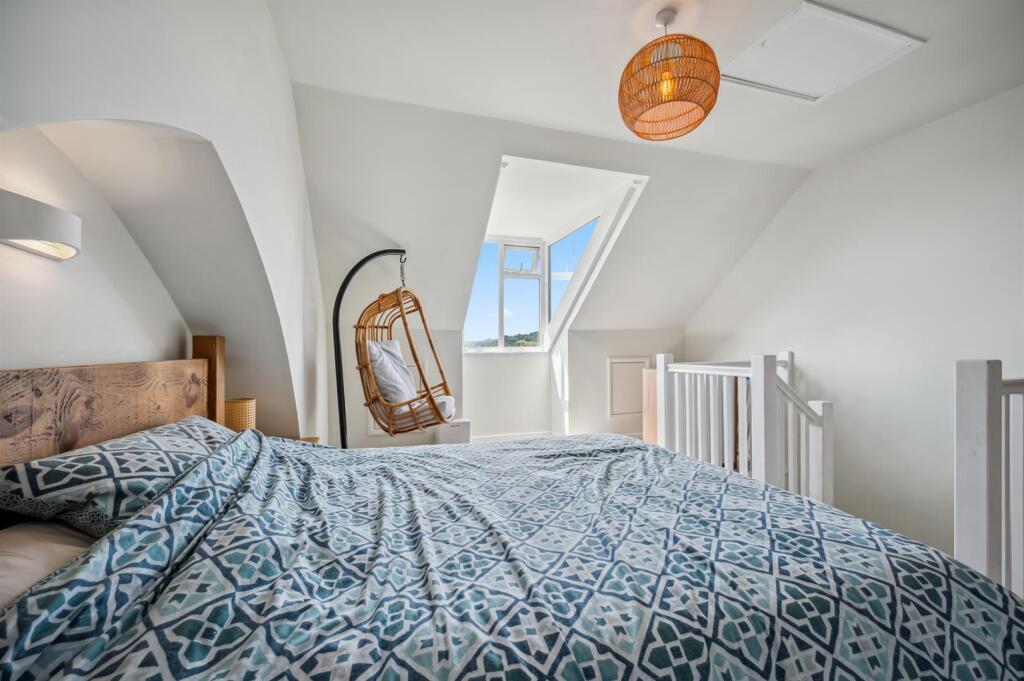 Bedroom Three - bed and egg chair.jpg