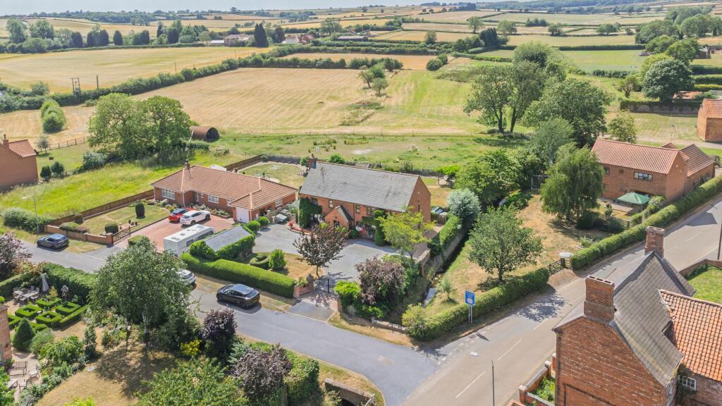 Nestled in village rural setting