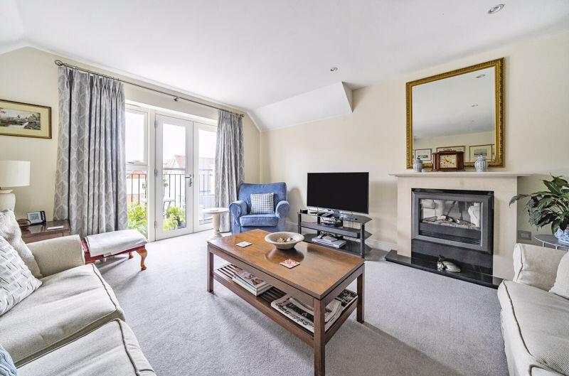 Living/dining room with balcony access