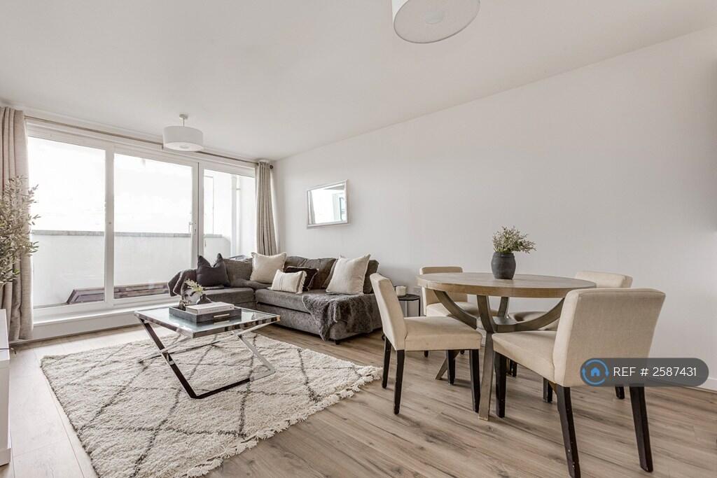 Living &amp; Dining Room With Sunset Balcony Views