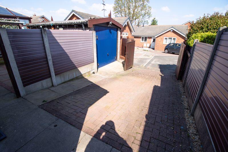 Rear Garage and Driveway