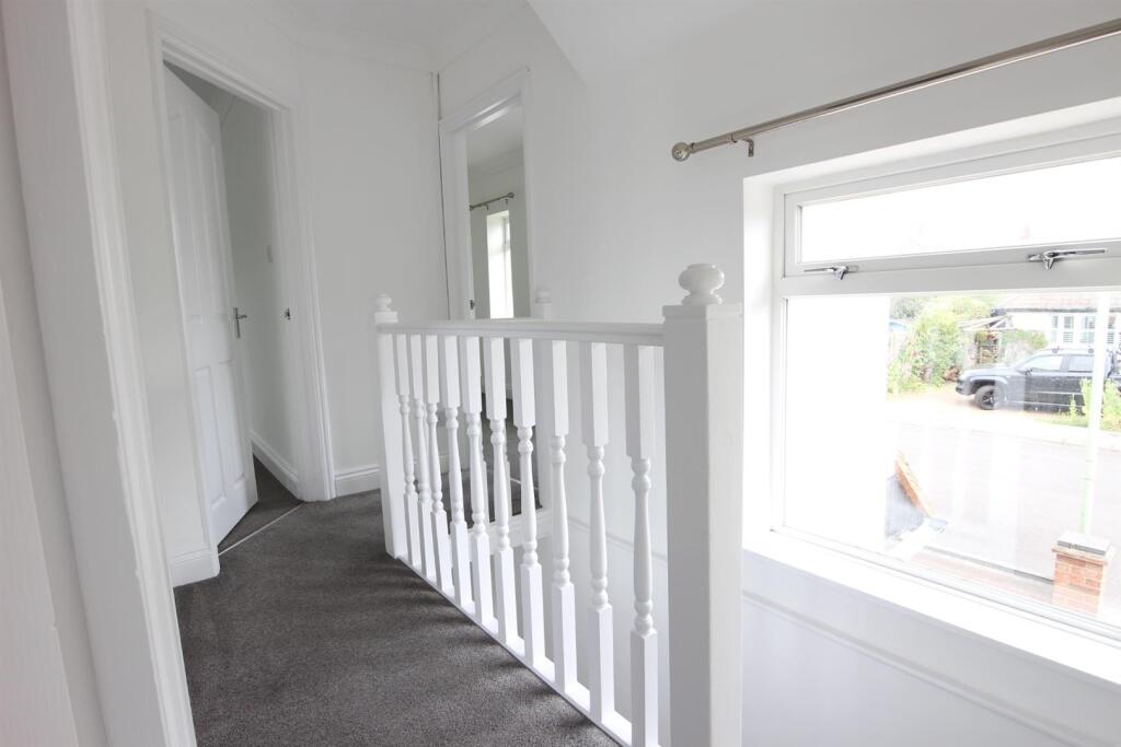 STAIRS TO FIRST FLOOR AND LANDING