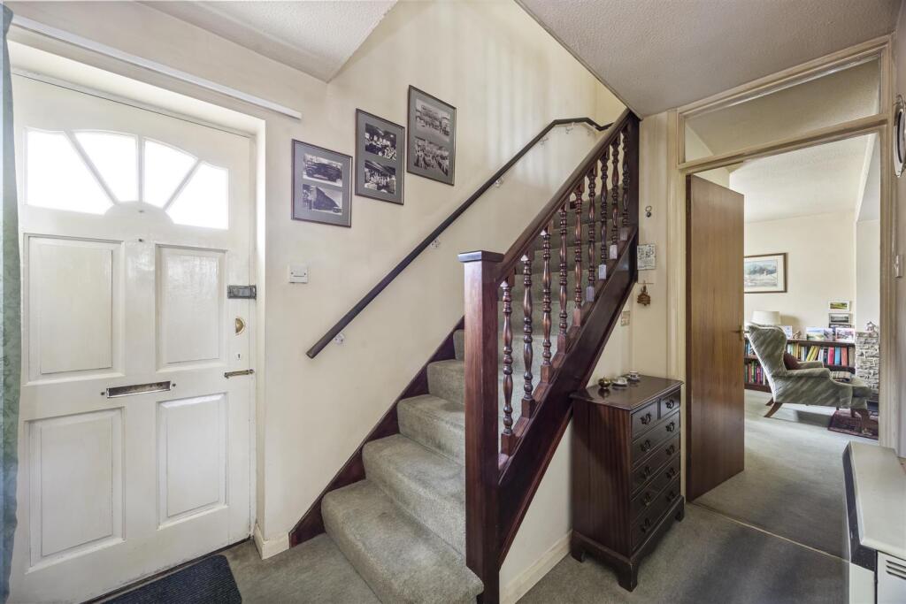 Stairs rising to First Floor