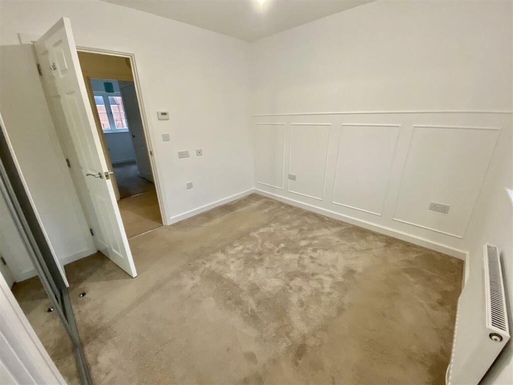 Master Bedroom with Built In Wardorbes