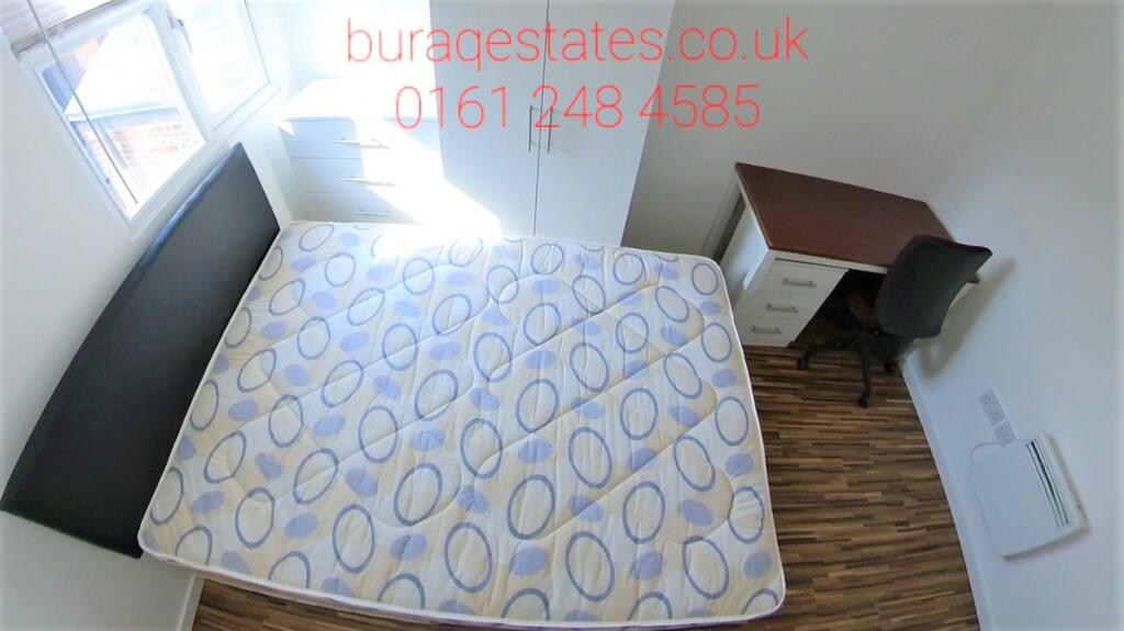 Bright and tidy single bedroom featuring a comf...