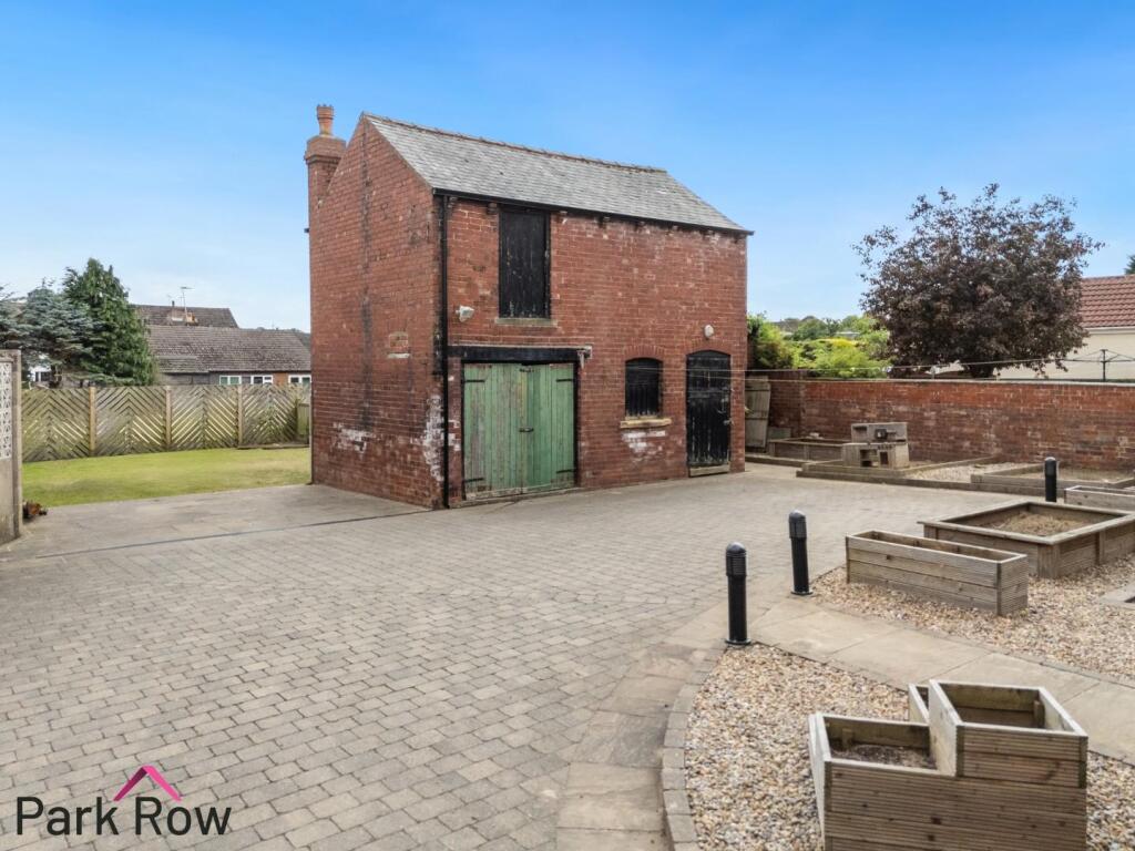 OUTBUILDING ONE