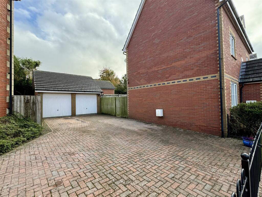 Detached Double Garage and Parking