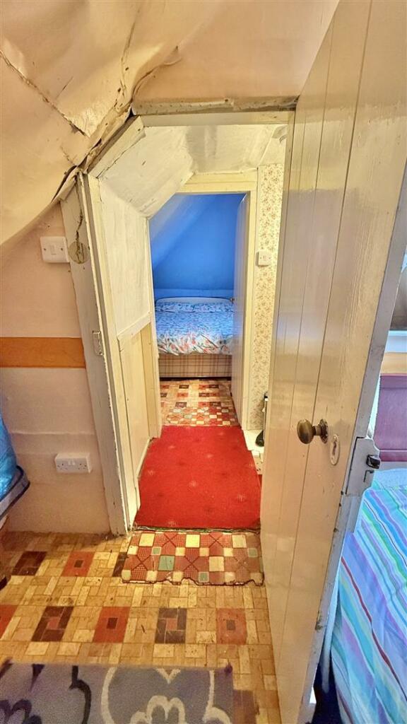 Attic hallway to room 2
