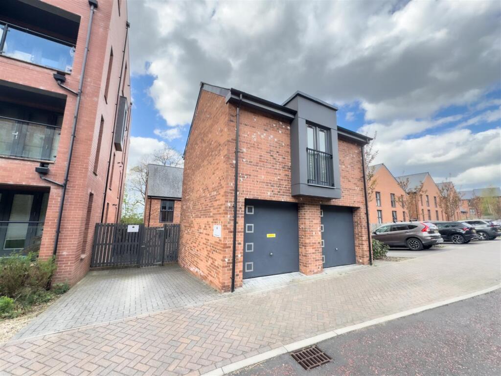 DOUBLE GARAGE WITH ROOM ABOVE