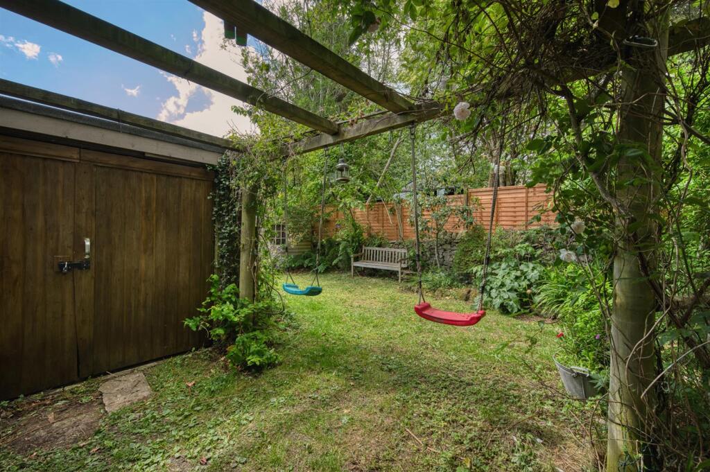 Garage, pergola and swings.jpg