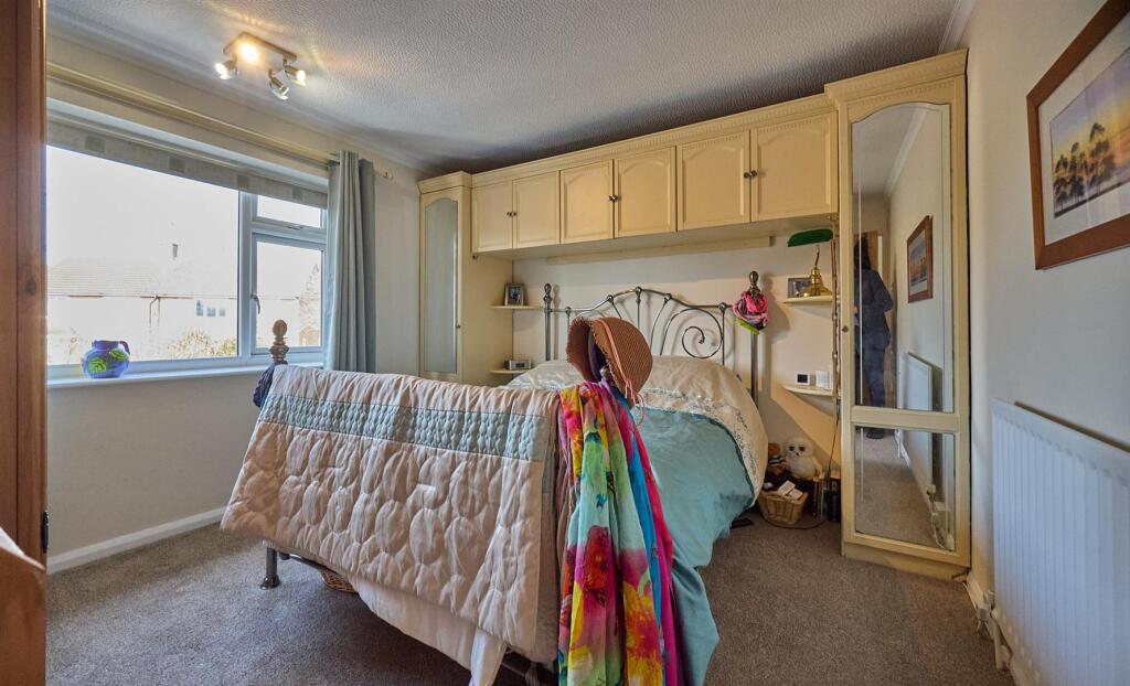 FRONT BEDROOM ONE