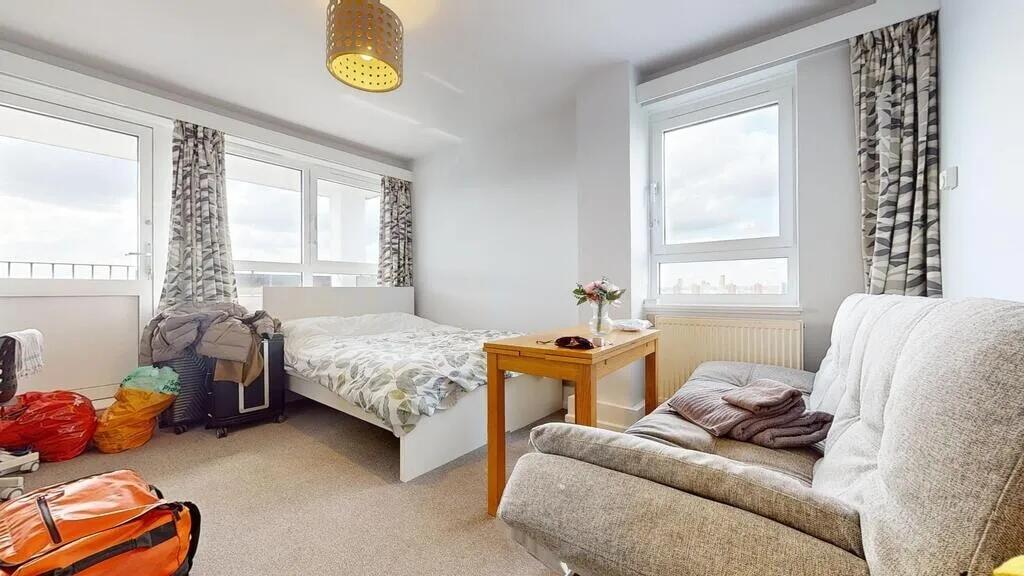 Bright and airy double bedroom featuring large ...