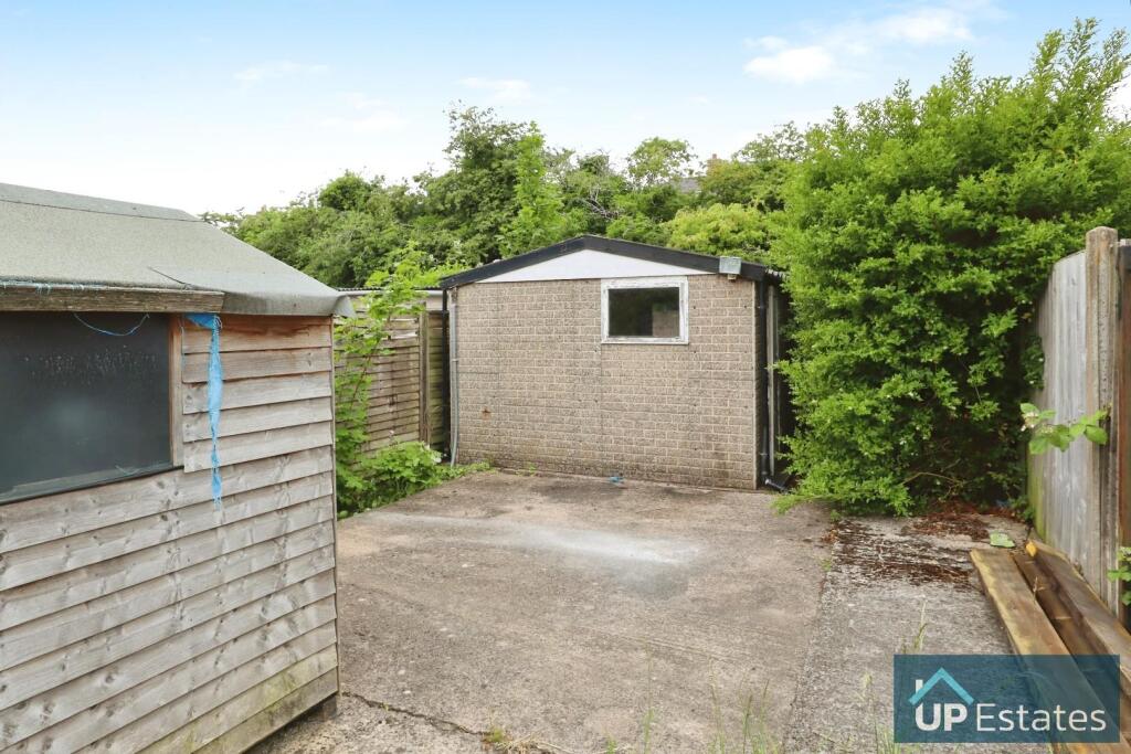 GARAGE TO REAR