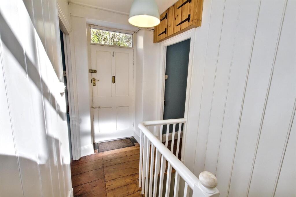 First floor landing and front door