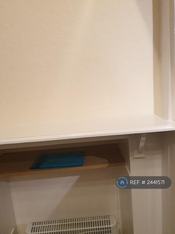 Mantlepiece With Shelf And Electric Heater Below 