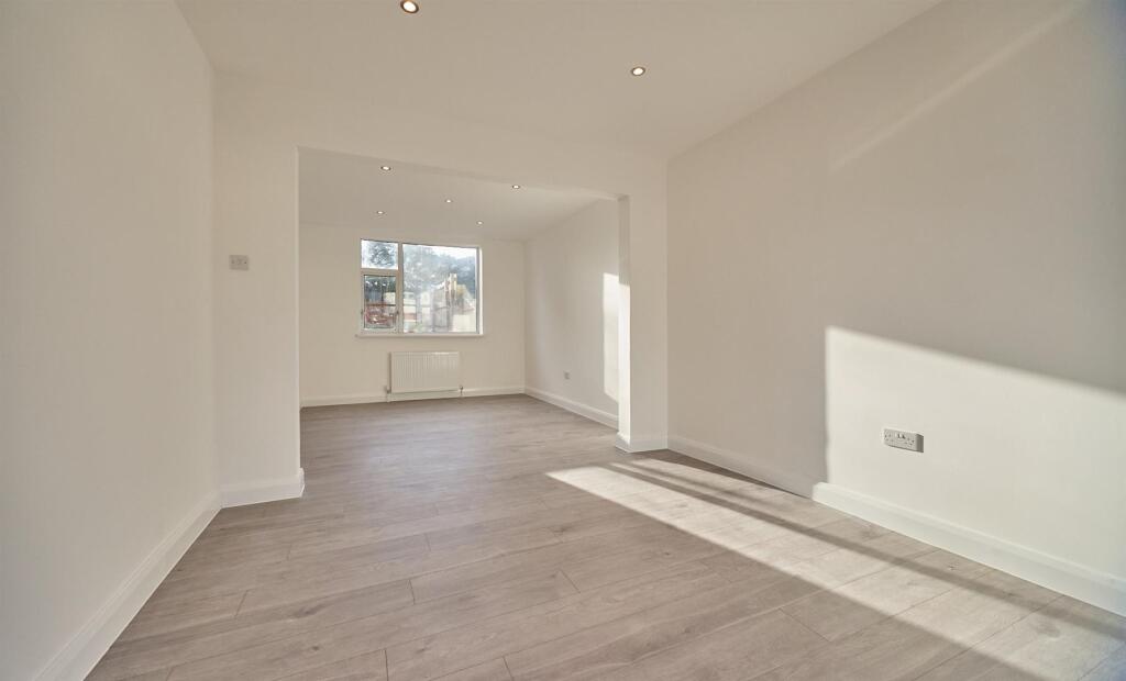 THROUGH LOUNGE DINING ROOM