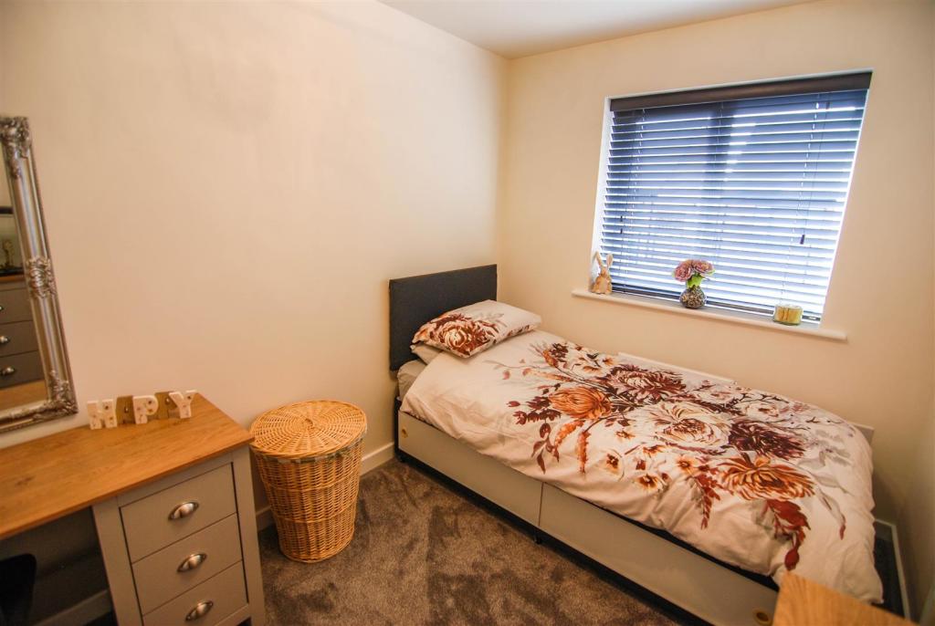 SECOND BEDROOM