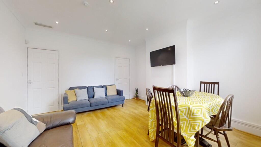 Bright and inviting living room featuring a com...