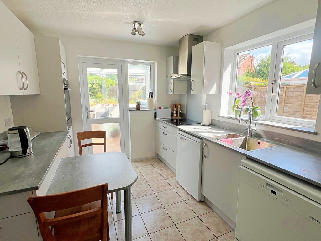 Kitchen with tabl...