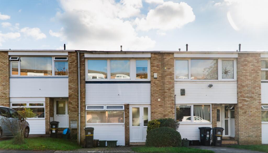 A bright and inviting exterior view of the prop...