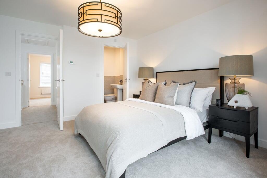 The main bedroom features an en suite for added luxury