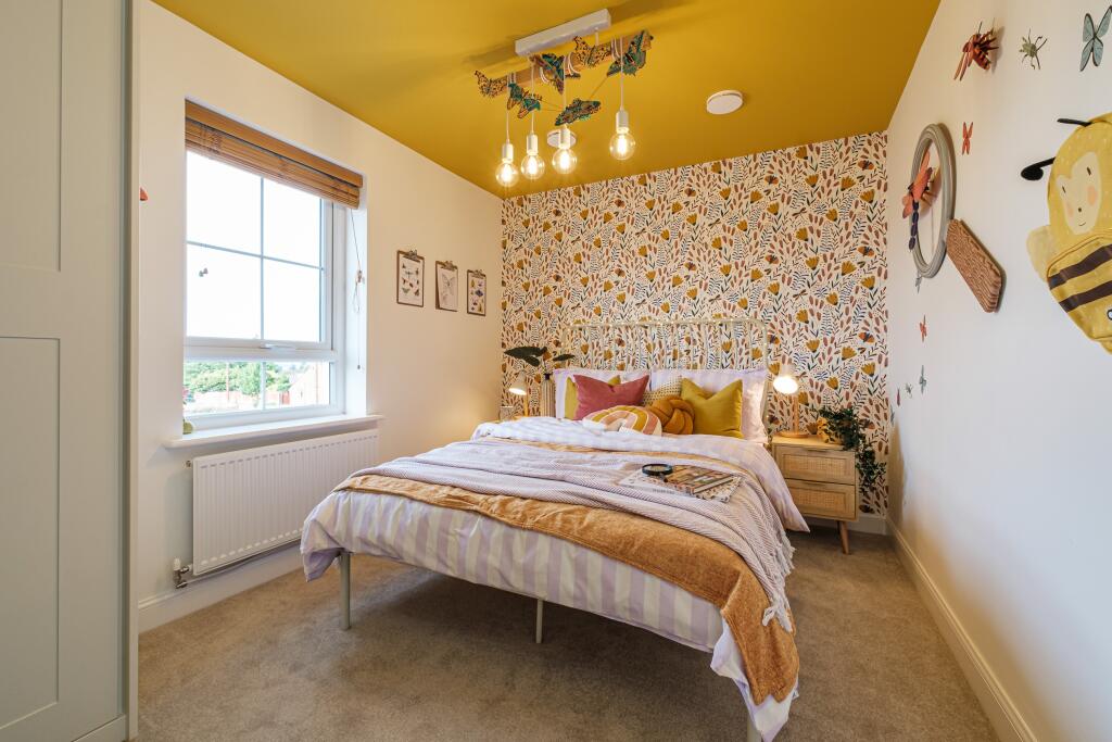Interior view of bedroom 2 in our 3 bed Martham home
