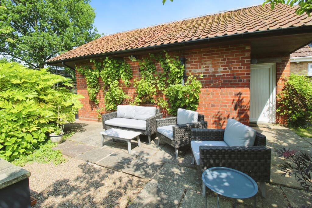 Patio and outbuildings