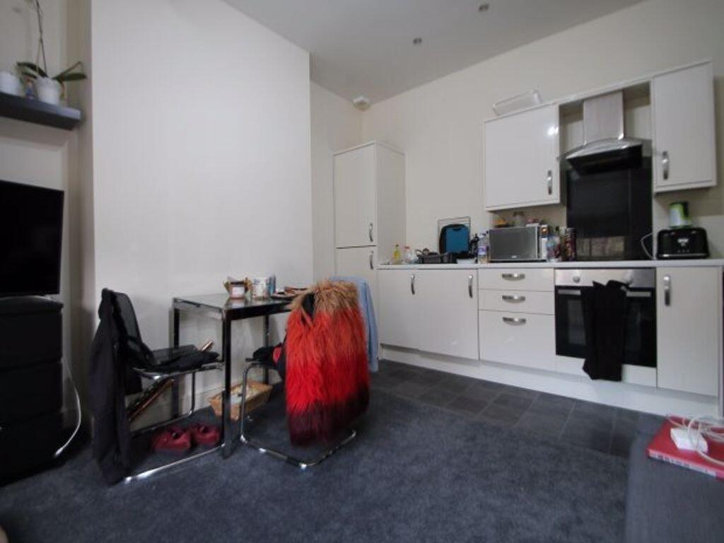 A bright and functional kitchen area featuring ...