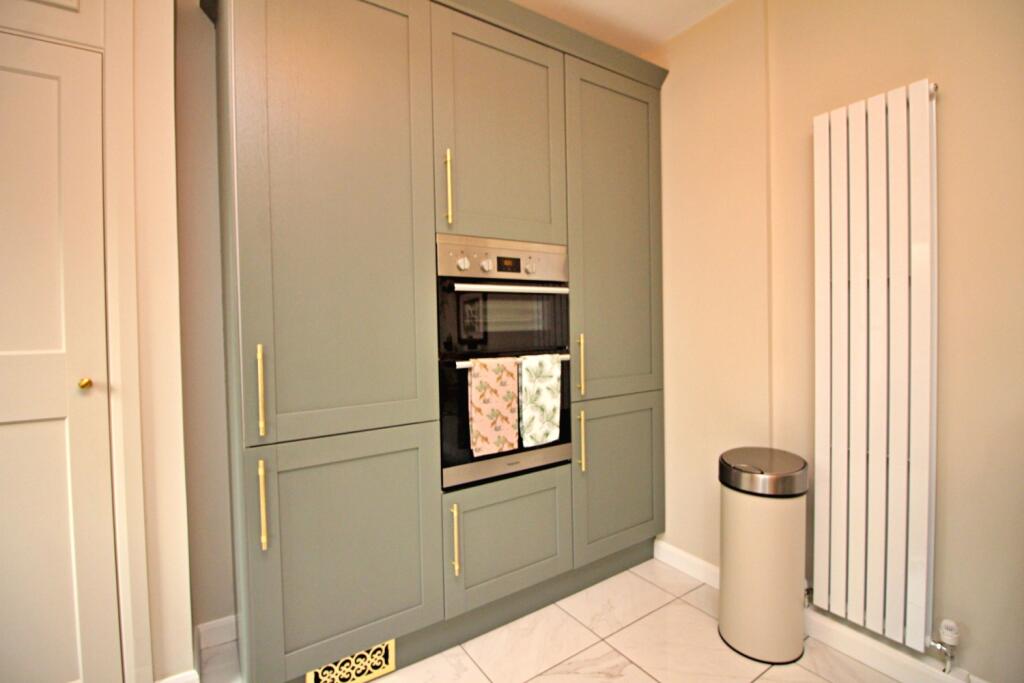 Integral fridge freezer and double oven