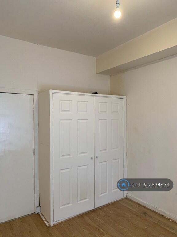 Bedroom Side With Wardrobe