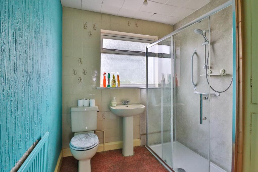 Shower room and original storage cupboard