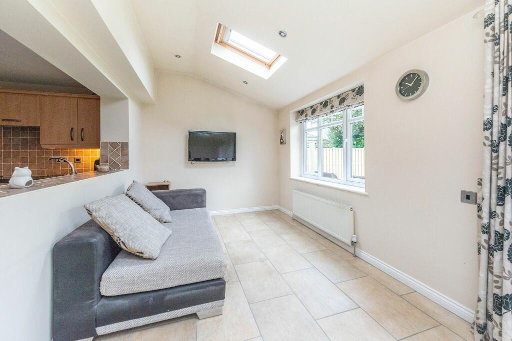 SITTING ROOM AND EXTENDED DINING KITCHEN