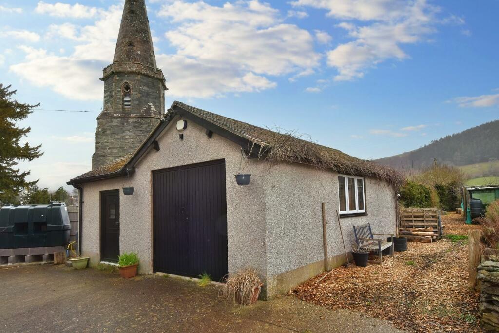 DETACHED OUTBUILDING