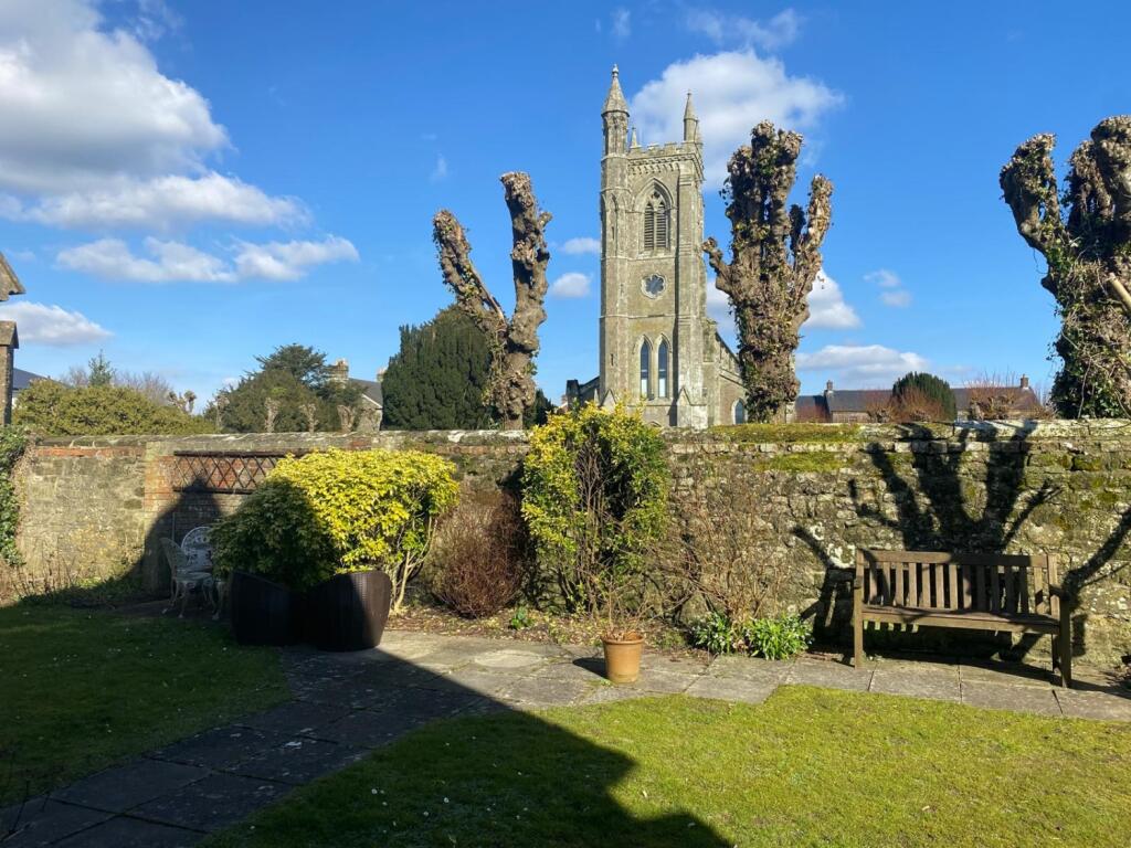 Gardens with church in background
