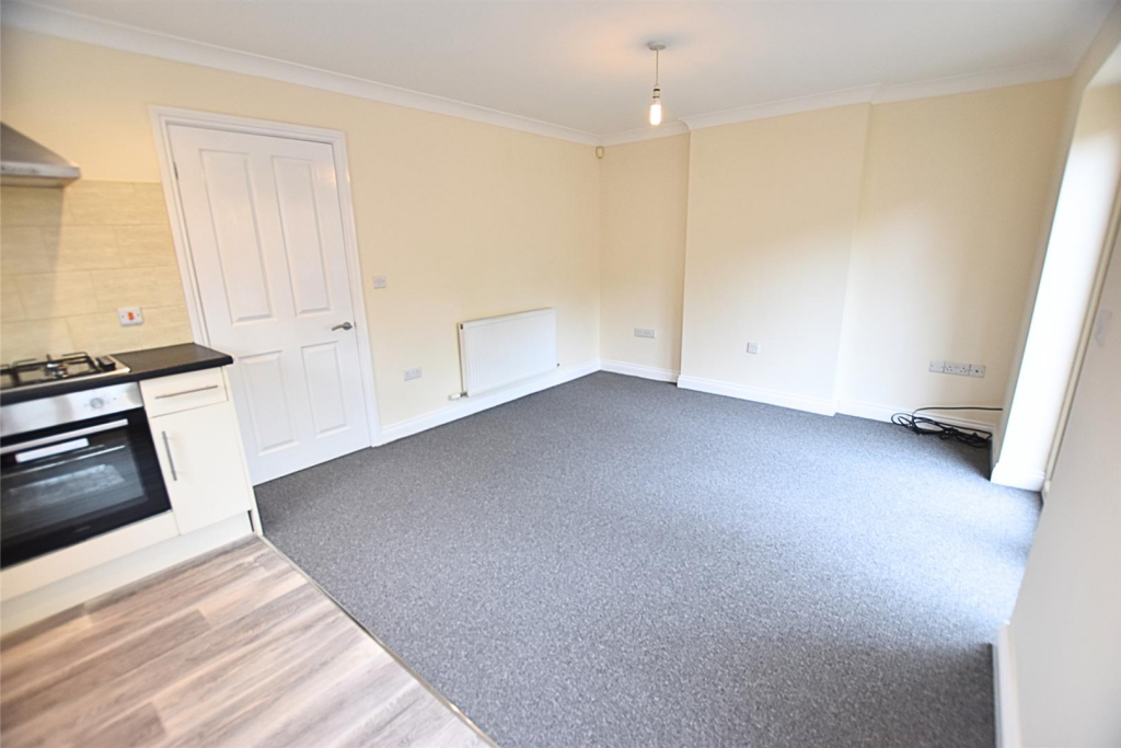 LIVING ROOM WITH OPEN PLAN KITCHEN AREA