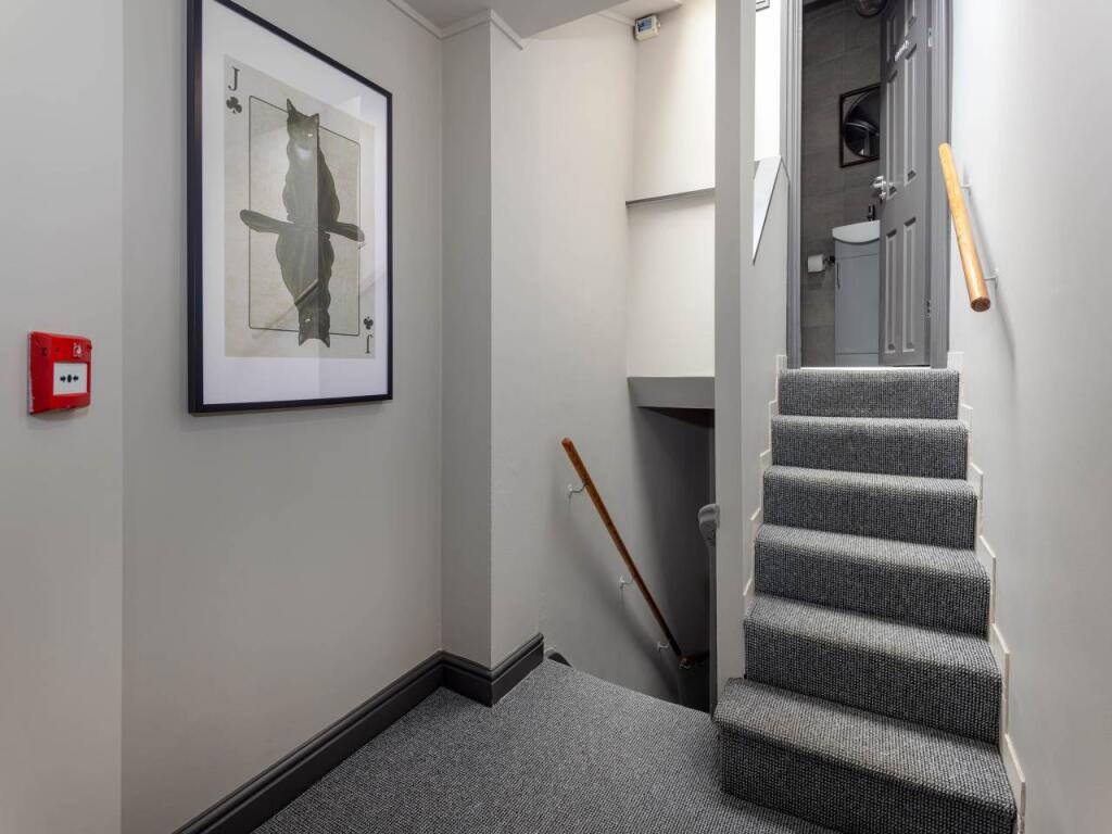 hallway to bathroom