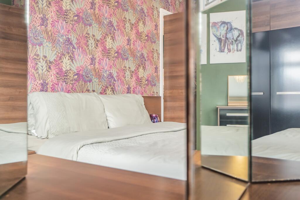 Main bedroom through mirror
