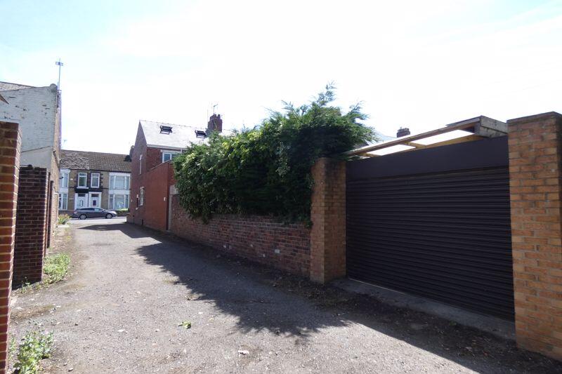 Side access to Garage door/off street...