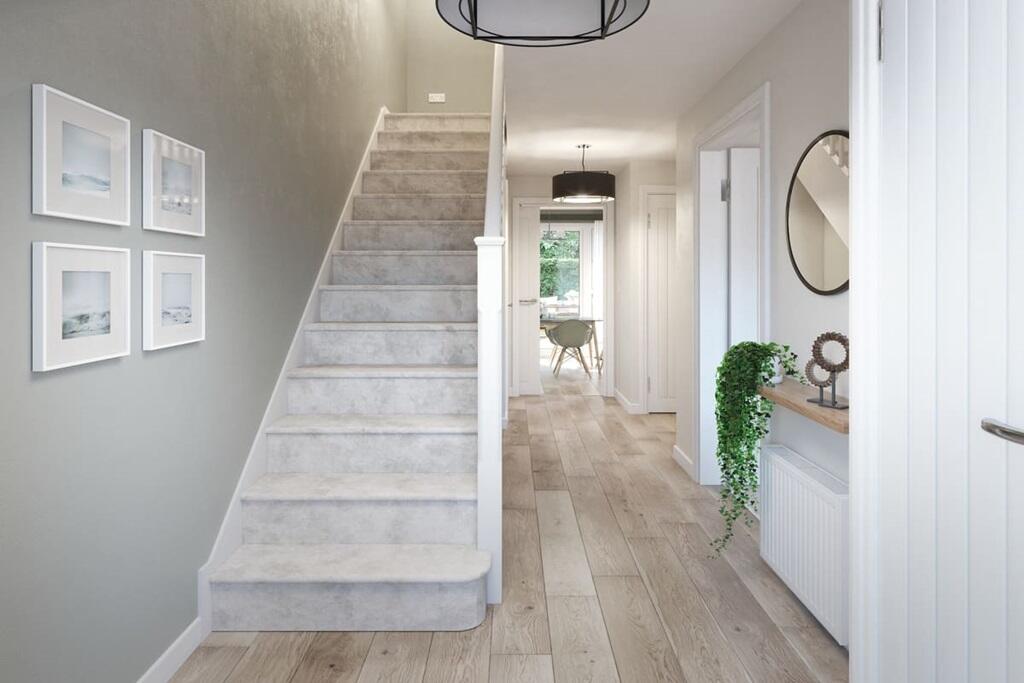 Flooded with natural light, this hallway benefits from a view straight through to the rear garden