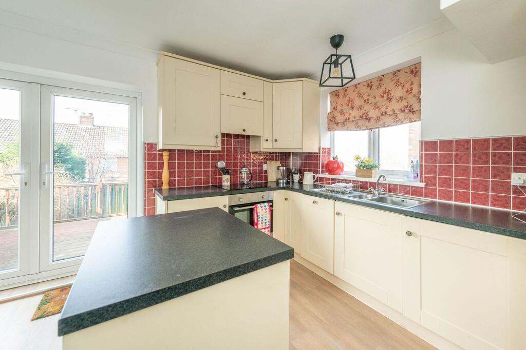SITTING ROOM AND DINING KITCHEN